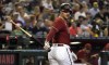 Arizona Diamondbacks' Christian Walker looks back at the umpire after a strike three call during the fourth inning of a baseball game against the San Francisco Giants, Sunday Sept. 25, 2022, in Phoenix. (AP Photo/Darryl Webb)