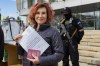 FILE - A woman shows her ballot to journalists prior to voting in a referendum in Luhansk, Luhansk People's Republic controlled by Russia-backed separatists, eastern Ukraine, Saturday, Sept. 24, 2022. Voting began Friday in four Moscow-held regions of Ukraine on referendums to become part of Russia. (AP Photo/File)