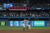 New York Yankees designated hitter Aaron Judge (99) celebrates after hitting his 61st home run of the season, a two-run shot, against the Toronto Blue Jays during seventh inning American League MLB baseball action in Toronto on Wednesday, September 28, 2022. The home run ties Roger Maris' American League single-season home run record. THE CANADIAN PRESS/Alex Lupul