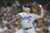 Los Angeles Dodgers starting pitcher Julio Urias throws to a San Diego Padres batter during the first inning of a baseball game Wednesday, Sept. 28, 2022, in San Diego. (AP Photo/Gregory Bull)
