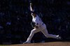 Chicago Cubs starting pitcher Keegan Thompson delivers in the late afternoon sun during the eighth inning of a baseball game against the Philadelphia Phillies, Thursday, Sept. 29, 2022, in Chicago. (AP Photo/Charles Rex Arbogast)