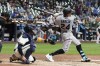 Miami Marlins' Avsail Garcia hits a grand slam during the eighth inning of a baseball game against the Milwaukee Brewers Thursday, Sept. 29, 2022, in Milwaukee. (AP Photo/Morry Gash)