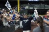 Seattle Mariners' Sam Haggerty celebrates after the team's baseball game against the Oakland Athletics, Friday, Sept. 30, 2022, in Seattle. The Mariners won 2-1 to clinch a spot in the playoffs. (AP Photo/Stephen Brashear)