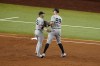 New York Yankees third baseman Josh Donaldson (28) talks with right fielder Aaron Judge (99) as he leaves the game in the second inning of the second baseball game of a doubleheader against the Texas Rangers in Arlington, Texas, Tuesday, Oct. 4, 2022. (AP Photo/Tony Gutierrez)