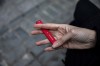 FILE - In this Jan. 31, 2020 photo a woman holds a flavored disposable vape device in New York. A government study on adolescent vaping, released on Thursday, Oct. 6, 2022, finds more than 2.5 million U.S. kids were using some form of e-cigarette in 2022, suggesting there’s been little progress in keeping vaping devices out of the hands of teenagers. (AP Photo/Marshall Ritzel, File)