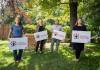 Shannon Moore (from left), Melanie Janzen, Marc Kuly and Tamara Kuly represent People for Public Education. (Jessica Lee / Winnipeg Free Press)