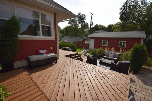 (Supplied) 
                                A large two-tiered deck and patio with sitting area make the gorgeous backyard a great spot to unwind.