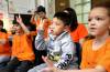 RUTH BONNEVILLE / WINNIPEG FREE PRESS 
                                These wide-eyed learners, along with hundreds of their young peers, participate in 60 minutes of Indigenous language lessons every six-day cycle.