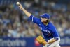 Toronto Blue Jays starting pitcher Kevin Gausman (34) works against the New York Yankees during first inning American League MLB baseball action in Toronto on Monday, September 26, 2022. THE CANADIAN PRESS/Nathan Denette