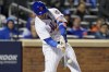 New York Mets Pete Alonso connects for a solo home run against the San Diego Padres during the fifth inning of Game 2 of a National League wild-card baseball playoff series, Saturday, Oct. 8, 2022, in New York. (AP Photo/John Minchillo)