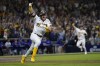 San Diego Padres' Jake Cronenworth reacts after hitting a two-run single during the seventh inning in Game 4 of a baseball NL Division Series against the Los Angeles Dodgers, Saturday, Oct. 15, 2022, in San Diego. (AP Photo/Ashley Landis)