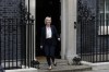 Britain's Prime Minister Liz Truss leaves 10 Downing Street to attend the weekly Prime Ministers' Questions session in parliament in London, Wednesday, Oct. 19, 2022. (AP Photo/Kin Cheung)