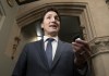 Prime Minister Justin Trudeau speaks with reporters before attending caucus on Parliament Hill, Wednesday, Oct. 19, 2022, in Ottawa. He says there were times during the 'Freedom Convoy' protests that the three levels of government were not working together as well as they could.THE CANADIAN PRESS/Adrian Wyld