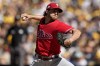 Philadelphia Phillies starting pitcher Aaron Nola throws against the San Diego Padres during the first inning in Game 2 of the baseball NL Championship Series between the San Diego Padres and the Philadelphia Phillies on Wednesday, Oct. 19, 2022, in San Diego. (AP Photo/Gregory Bull)