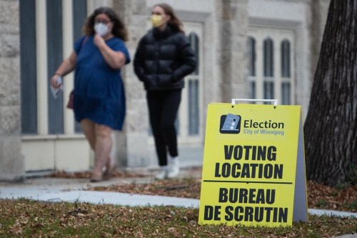 Signage outside the First Presbyterian Church in the Wolseley neighbourhood of Winnipeg directs voters to the polling station on Wednesday, October 26, 2022. Scott Gillingham has been elected mayor of Winnipeg, replacing Brian Bowman, who did not seek re-election. THE CANADIAN PRESS/Daniel Crump