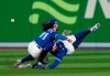 Toronto Blue Jays shortstop Bo Bichette (11) and centre-fielder George Springer (4) collide while to trying to catch a short fly ball during eighth inning American League wild card MLB baseball action against the Seattle Mariners in Toronto on Saturday, October 8, 2022. Outfielder Springer has had a bone spur removed from his right elbow. THE CANADIAN PRESS/Frank Gunn