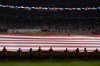 The American flag is unfurled during the national anthem beforeGame 1 of baseball's World Series between the Houston Astros and the Philadelphia Phillies on Friday, Oct. 28, 2022, in Houston. (AP Photo/Sue Ogrocki)