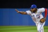 Toronto Blue Jays first baseman Vladimir Guerrero Jr. (27) forces out Philadelphia Phillies shortstop Didi Gregorius (18) at first base during sixth inning interleague MLB action in Toronto on Tuesday, July 12, 2022. Guerrero has won his first career American League Gold Glove Award. THE CANADIAN PRESS/Christopher Katsarov