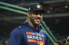 Houston Astros starting pitcher Justin Verlander smiles before Game 3 of baseball's World Series between the Houston Astros and the Philadelphia Phillies on Tuesday, Nov. 1, 2022, in Philadelphia. (AP Photo/Chris Szagola)