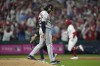 Philadelphia Phillies' Rhys Hoskins rounds the bases after a home run off Houston Astros starting pitcher Lance McCullers Jr. during the fifth inning in Game 3 of baseball's World Series between the Houston Astros and the Philadelphia Phillies on Tuesday, Nov. 1, 2022, in Philadelphia. (AP Photo/David J. Phillip)