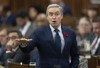 Innovation, Science and Industry Minister Francois-Philippe Champagne rises during Question Period in Ottawa, Oct. 31, 2022. The move by the federal government to force Chinese companies to sell their investments three junior mining companies is being called a meaningful and necessary escalation of Canada's defensive posturing on strategic assets. THE CANADIAN PRESS/Adrian Wyld