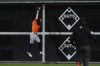 Houston Astros left fielder Chas McCormick catches a fly ball hit by Philadelphia Phillies' J.T. Realmuto during the ninth inning in Game 5 of baseball's World Series between the Houston Astros and the Philadelphia Phillies on Thursday, Nov. 3, 2022, in Philadelphia. (AP Photo/Matt Slocum)