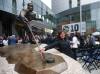 JOHN WOODS / THE CANADIAN PRESS
Crystal Hawerchuk poses for a photo with the statue of her late husband and former Winnipeg Jets star Dale Hawerchuk at True North Square outside of the Canada Life Centre in Winnipeg, Saturday.