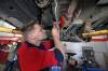 ERIK PINDERA / WINNIPEG FREE PRESS
                                Jerry Mitchell, a technician at Harvest Honda in Steinbach, engraves a vehicle identification number into a catalytic converter on Friday. The local RCMP detachment will receive $40,000 to purchase engravers and heat-resistant paint for area garages.