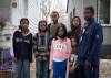 JESSICA LEE / WINNIPEG FREE PRESS The family of 17-year-old David Bunguke gather at the family home on October 21, 2022, days after his death. Bunguke’s father John Bungkuke, stands on the right.