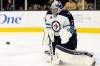 Winnipeg Jets goaltender Connor Hellebuyck (37) prepares to make a save during the second period in an NHL hockey game against the Vegas Golden Knights, Sunday, Oct. 30, 2022, in Las Vegas. (AP Photo/Ellen Schmidt)