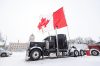 Mike Sudoma / Winnipeg Free Press
A massive Canadian flag is seen flying from the back of a semi truck.