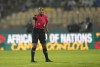 FILE - Referee Salima Mukansanga, of Rwanda, gestures towards the players during the African Cup of Nations 2022 group B soccer match between Zimbabwe and Guinea at the Ahmadou Ahidjo stadium in Yaounde, Cameroon, Tuesday, Jan. 18, 2022. (AP Photo/Themba Hadebe, File)