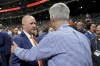 Houston Astros general manager James Click, left, and Philadelphia Phillies President of Baseball Operations, David Dombrowski meet before Game 1 of baseball's World Series between the Houston Astros and the Philadelphia Phillies on Friday, Oct. 28, 2022, in Houston. (AP Photo/David J. Phillip)