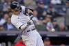 New York Yankees center fielder Aaron Judge connects for a solo home run during the second inning of Game 5 of an American League Division baseball series against the Cleveland Guardians, Tuesday, Oct. 18, 2022, in New York. (AP Photo/Frank Franklin II)