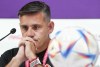 Canada head coach John Herdman looks down unhappily after being well over 30 minutes late for their opening press conference ahead of their first match against Belgium at the World Cup in Doha, Qatar during on Tuesday, November 22, 2022. THE CANADIAN PRESS/Nathan Denette