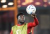 Canada forward Alphonso Davies plays with the ball during practice at the World Cup in Doha, Qatar, Tuesday, Nov. 22, 2022. A friendly rivalry has formed between the Belgian community in Montreal and Canadian soccer fans as anticipation grows for the Canada versus Belgium match. THE CANADIAN PRESS/Nathan Denette