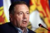 Alberta Premier Jason Kenney responds to a question from the media on the final day of the summer meeting of Canada's Premiers at the Fairmont Empress in Victoria, B.C., on Tuesday, July 12, 2022. Kenney, the former Premier of Alberta, accused Ottawa of leaving provinces 