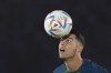 Portugal's Cristiano Ronaldo controls a ball during the Portugal's official training on the eve of the group H World Cup soccer match between Portugal and Ghana at the Al Shahaniya SC training site in Al Shahaniya, Qatar, Wednesday, Nov. 23, 2022. (AP Photo/Lee Jin-man)