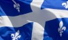 Quebec's provincial flag flies on a flag pole in Ottawa on June 30, 2020. A Quebec report released today confirms cases of imposed sterilizations of First Nations and Inuit women in the province and calls for the practice to end.THE CANADIAN PRESS/Adrian Wyld