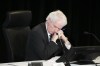 Commissioner Paul Rouleau rests on his hands as Prime Minister Justin Trudeau appears as a witnesses at the Public Order Emergency Commission in Ottawa, on Friday, Nov. 25, 2022. THE CANADIAN PRESS/Sean Kilpatrick