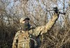 A Ukrainian serviceman flies a drone during an operation against Russian positions at an undisclosed location in the Donetsk region, Ukraine, Sunday, Dec. 4, 2022. (AP Photo/Roman Chop)