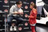 Canadian soccer star Christine Sinclair autographs a fan's ball at a World Cup watch party in Toronto on Wednesday, Nov. 23, 2022. Sinclair is serving as an adviser to Project 8 Sports Inc., a new pro women's soccer league planned to kick off in Canada in 2025. THE CANADIAN PRESS/Arlyn McAdorey