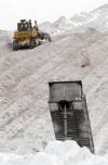 PHIL HOSSACK / WINNIPEG FREE PRESS - A single cat pushes snow up the Kenaston St Snow Dump Tuesday morning after the city’s latest blizzard cleared.Often dubber "Mount Manitoba" the site is filling up fast with this year’s snow accumulation. At one point over 100 pieces of equipment were clearing streets for the morning rush hour….January 3 ,2017