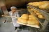 JASON HALSTEAD / WINNIPEG FREE PRESS
                                Employee Justin Ross puts loaves of rye onto a cooling rack at KUB Bakery on Erin Street in the West End on Nov. 2, 2016. KUB Bakery has been making Winnipeg-style Rye bread, using virtually the same recipe, since 1923. (See Sanderson ‘The City’ story for Sunday, Nov. 6, 2016)