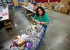 Shawna Bell, executive director of the Christmas Cheer Board, believes they could get as many as 19,000 requests for hampers this year. (John Woods / Winnipeg Free Press)