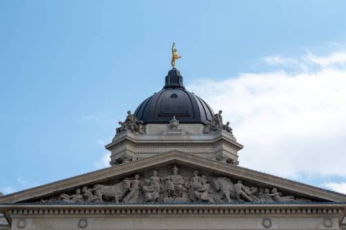 ALEX LUPUL / WINNIPEG FREE PRESS The Golden Boy stands atop the Manitoba Legislative Building’ in Winnipeg on Monday, July 5, 2021. It embodies the spirit of enterprise and eternal youth, and is poised atop the dome of the building. Reporter: Ben Waldman