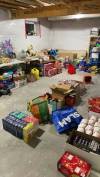 Ally’s basement becomes a hamper making station, filled with donations of food and toys for the holiday hampers she’s made for several families over the past three years.