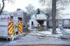 MIKE DEAL / WINNIPEG FREE PRESS
                                Fire crews at the scene of a house fire at 402 Manitoba Ave. on Wednesday morning.