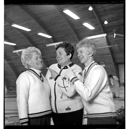 Jan. 8, 1969, women curlers (from left) Peggy Casselman, Marg Hudson and Glenda Buhr in their curling sweaters. (University of Manitoba Archives).