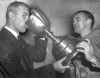 Bud Grant, left, Coach, Winnipeg Blue Bombers 1958. Keith pearce, right, tips Grey Cup.